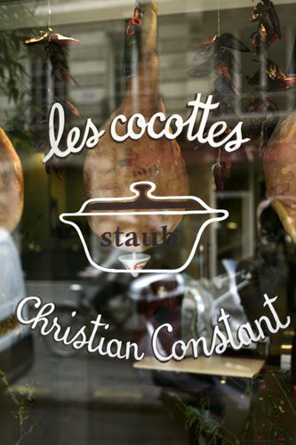 A window with the words " les cocottes christian constant ".