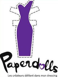 A purple paper doll with the words paperdolls written underneath.